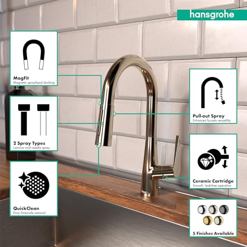 Polished nickel pull-down kitchen faucet with curved spout and 2-spray functionality mounted on subway tile backsplash.