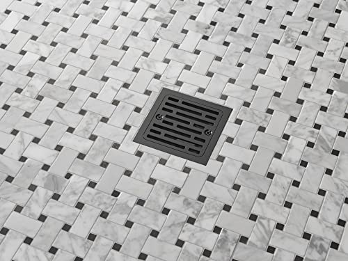 Matte black square shower drain installed in a white and gray tile floor.