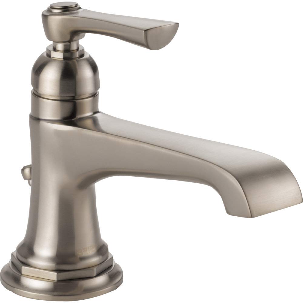 Brushed nickel single-handle bathroom faucet with curved spout and round base.