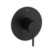 Matte black circular valve trim with recessed handle and red and blue indicator dots.