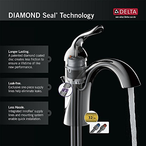 Chrome single-handle pull-down kitchen faucet with integrated soap dispenser and DIAMOND Seal Technology.