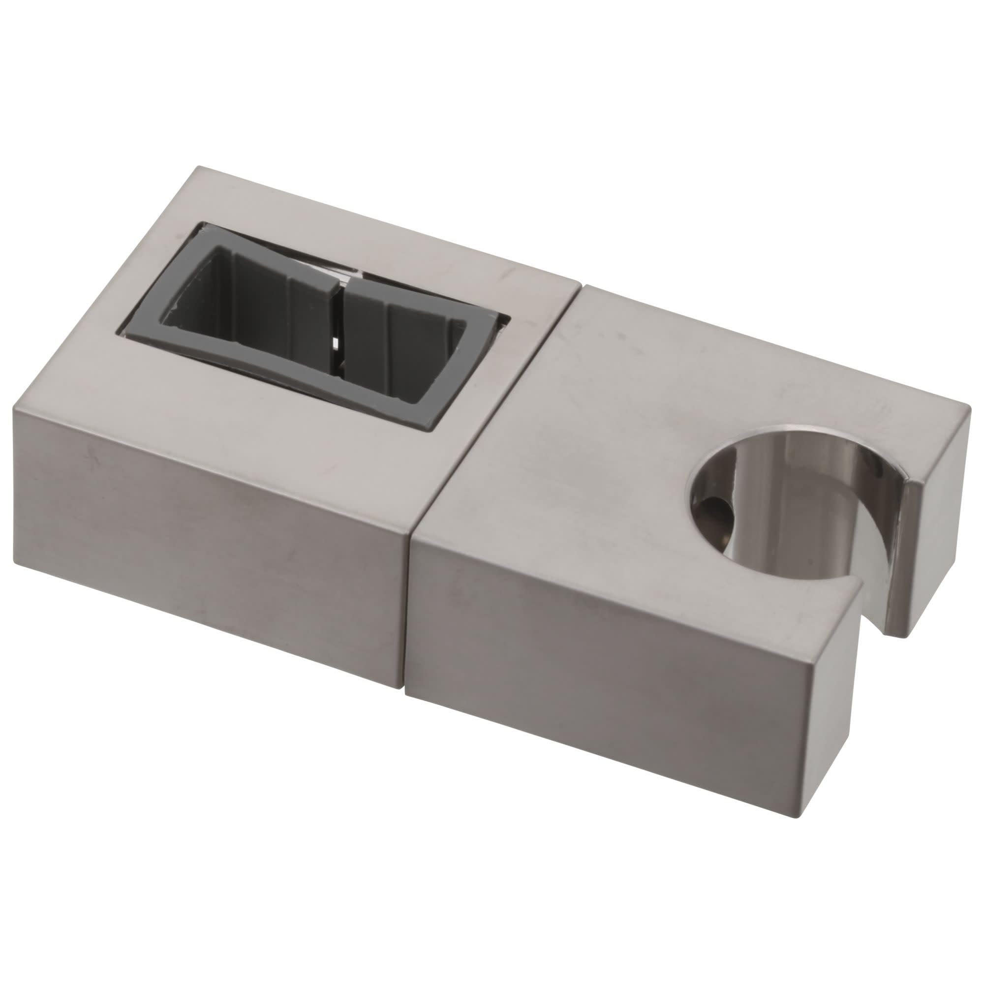 Stainless steel shower slide bar bracket with rectangular mounting slot and circular holder opening on gray base.