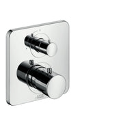 Chrome thermostatic shower trim with two cylindrical control handles mounted on a square escutcheon plate.