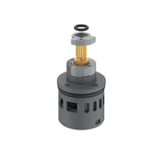Gray diverter valve cartridge with brass stem and black rubber seal ring, disassembled view.