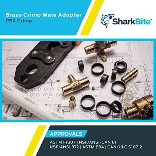 Brass crimp male connectors with black crimp rings and a crimping tool displayed on plumbing blueprints.