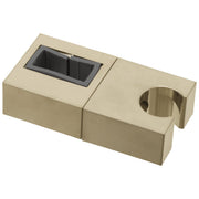 Champagne bronze slide bar mechanism with rectangular mounting bracket and cylindrical holder on cream-colored base.