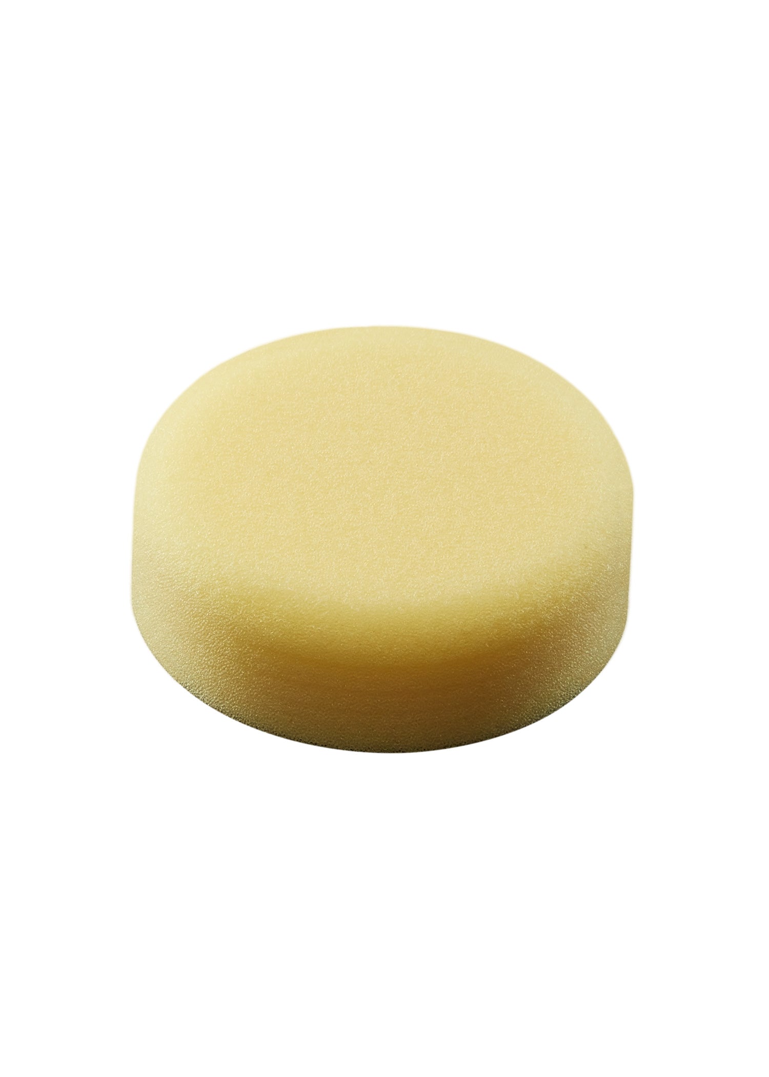 Round yellow foam polishing pad with textured surface, 3 inches in diameter.