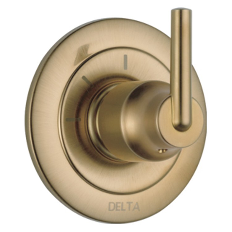 Champagne bronze diverter trim with rounded escutcheon plate, rotary handle, and control dial marked with three settings.