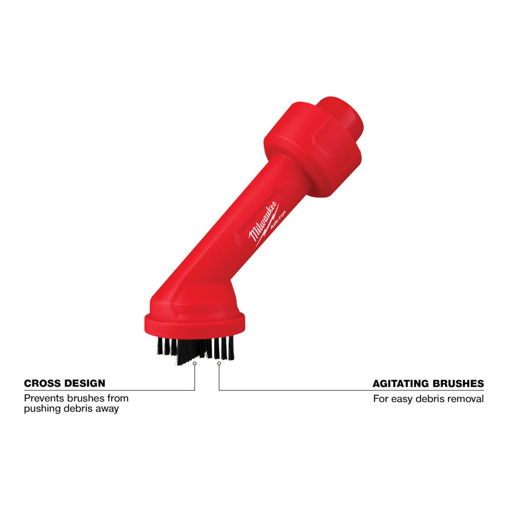 Red Milwaukee AIR-TIP cross brush tool with angled head and black agitating bristles at the base.