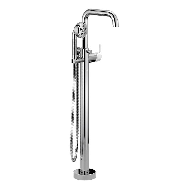 Chrome freestanding tub filler with single lever handle, curved spout, handheld showerhead, and floor-mounted base.