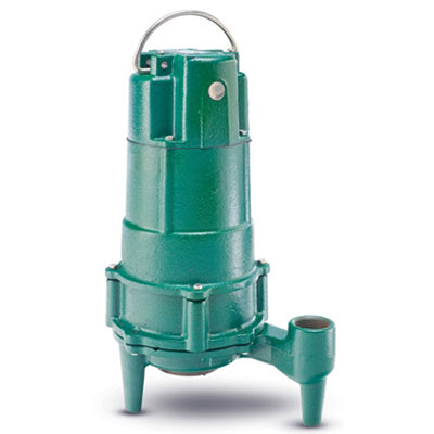 Green cast iron submersible grinder pump with handle, outlet port, and four legs.