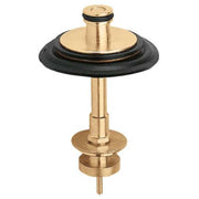 Brass discharge valve assembly with black rubber seal and threaded connector base.