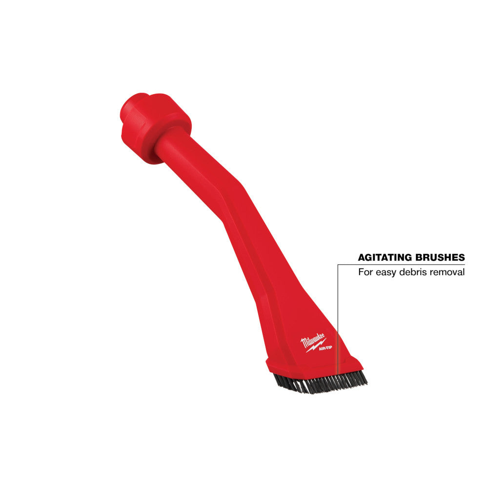 Red claw utility nozzle with angled neck and black bristle brush attachment at tip.