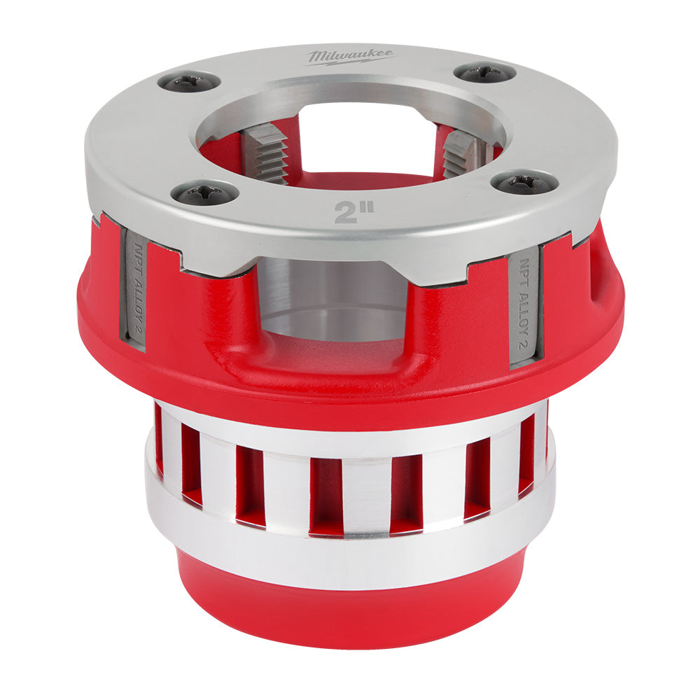 Milwaukee 2" aluminum die head with red and silver components, visible threading dies and mounting holes.