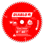 Red circular Diablo carbide saw blade with 60 teeth, 6-1/4 inch diameter, white teeth around edge and center arbor hole.