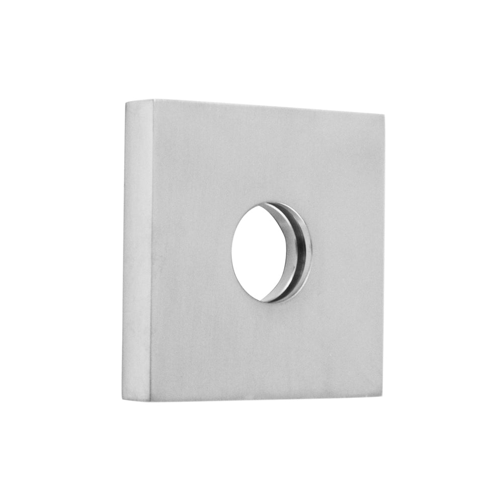 Square polished chrome escutcheon with circular opening for pipe or valve installation.
