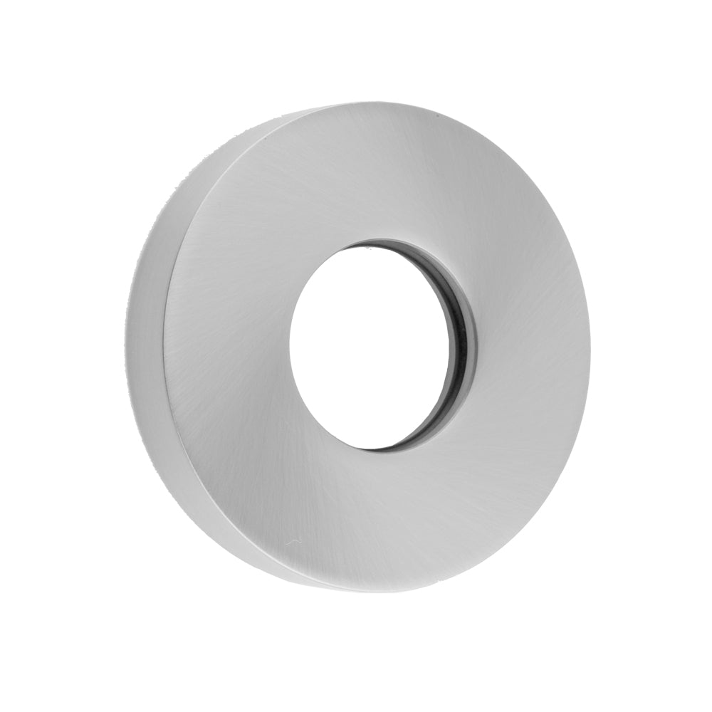 Round metal escutcheon with central opening and brushed finish in gray tone.