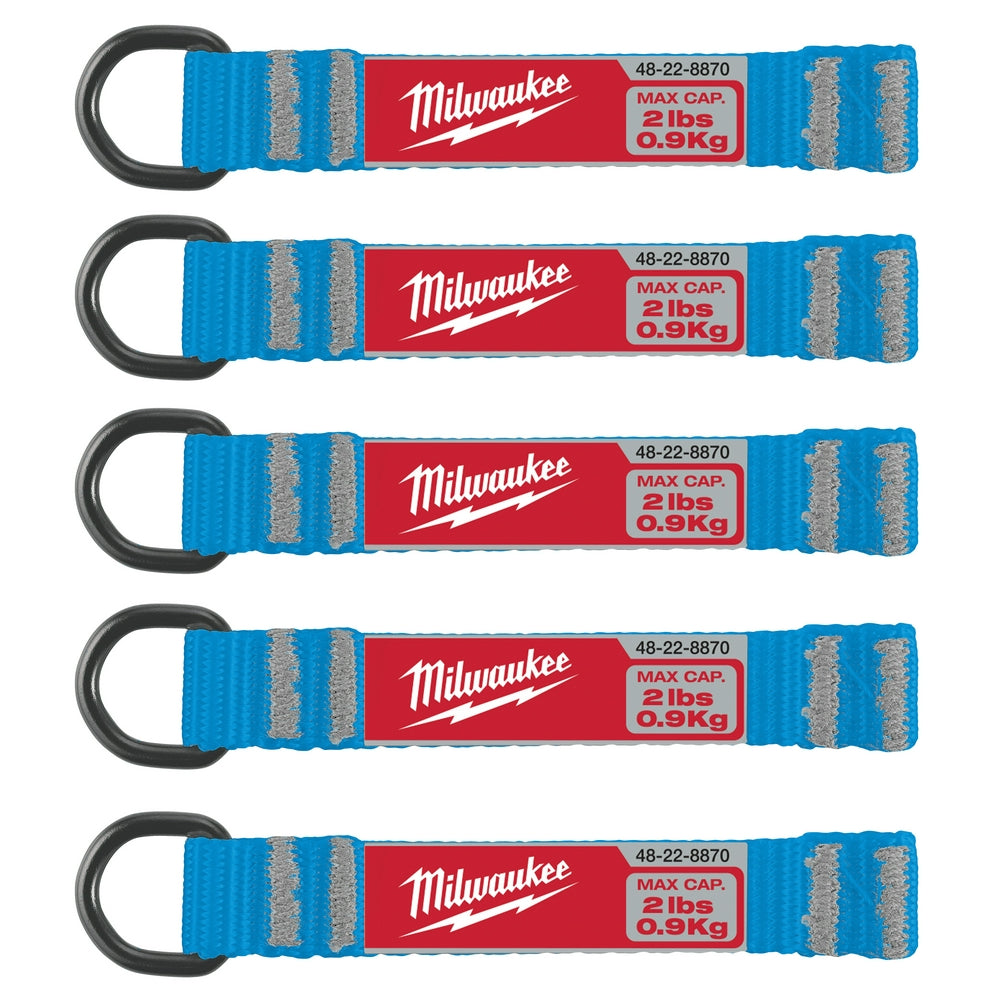 Five blue web attachments with black D-rings, gray reflective strips, and red Milwaukee labels rated 2lbs capacity.