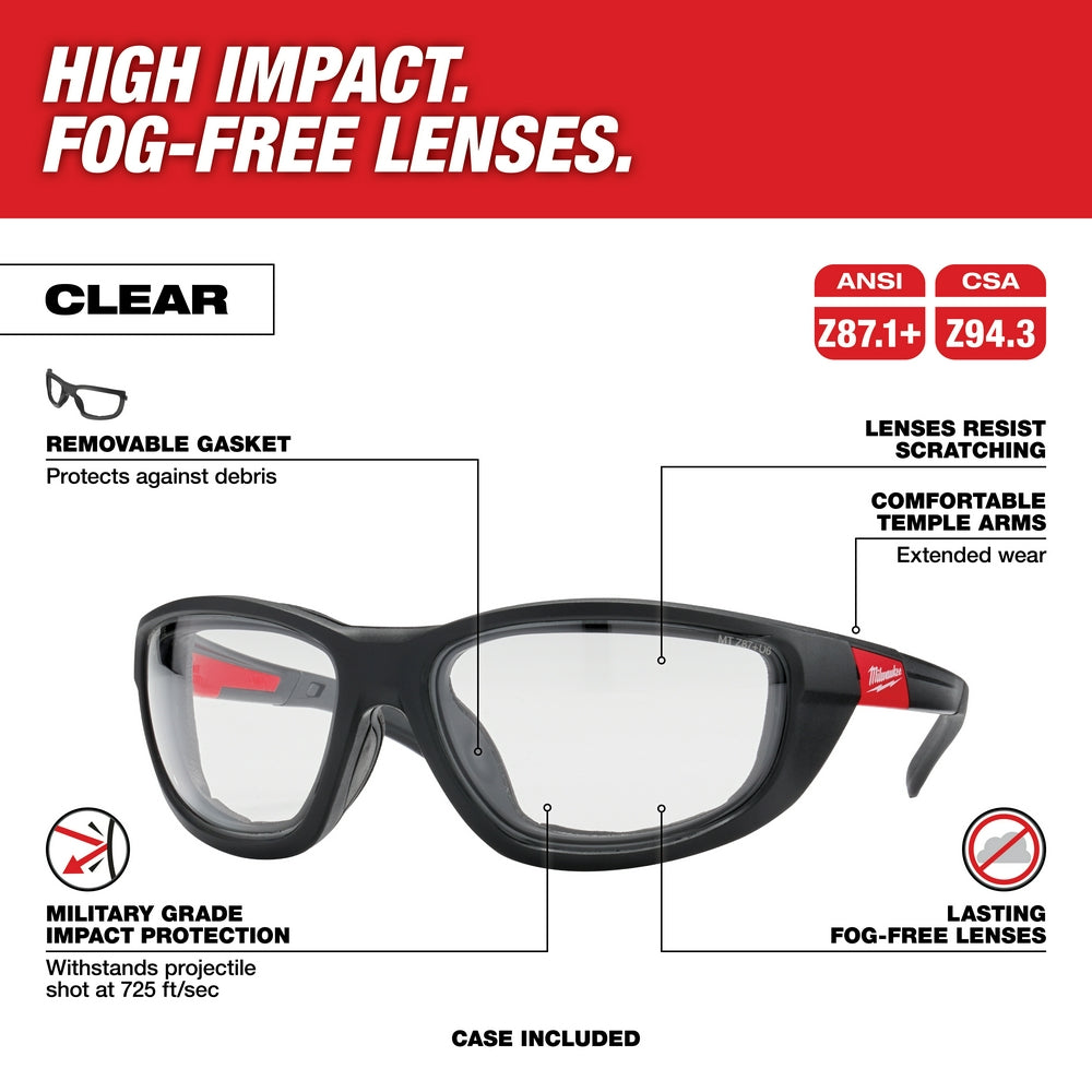 Clear safety glasses with black frame, removable gasket, red temple accents, and fog-free lenses.