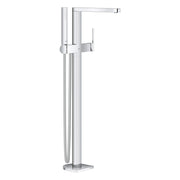 Chrome freestanding tub faucet with single handle, curved spout, and handheld shower wand on floor-mounted base.