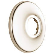 Polished nickel shower flange with circular escutcheon plate and center opening for pipe installation.