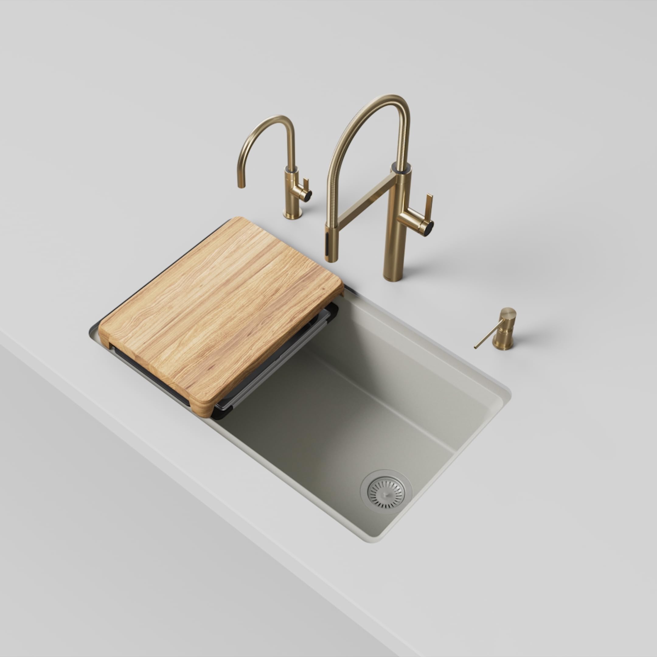 White undermount kitchen sink with wood cutting board, single bowl, and brass faucet fixtures displayed from above.