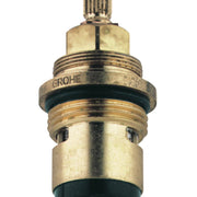 Grohe ceramic cartridge with brass body, black rubber seals, and threaded connections for faucet repair.
