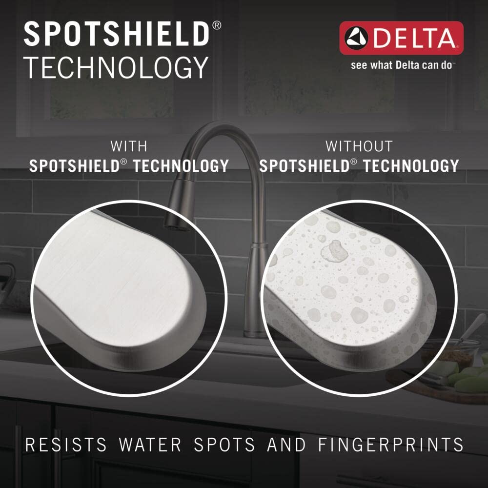 Stainless steel kitchen faucet with pull-down sprayer shown with comparison of spotshield technology resisting water spots.