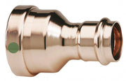 Copper press reducer fitting with larger diameter on left side, smaller diameter on right side, and green identification dot.