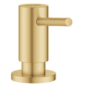 Grohe Cosmopolitan soap dispenser with brushed gold finish, cylindrical pump body, and round base with side lever.