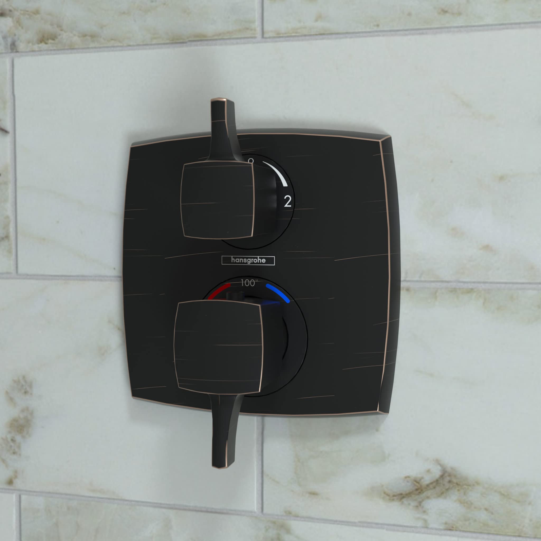 Square rubbed bronze thermostatic trim with upper volume control lever, lower temperature dial with red and blue indicators, 