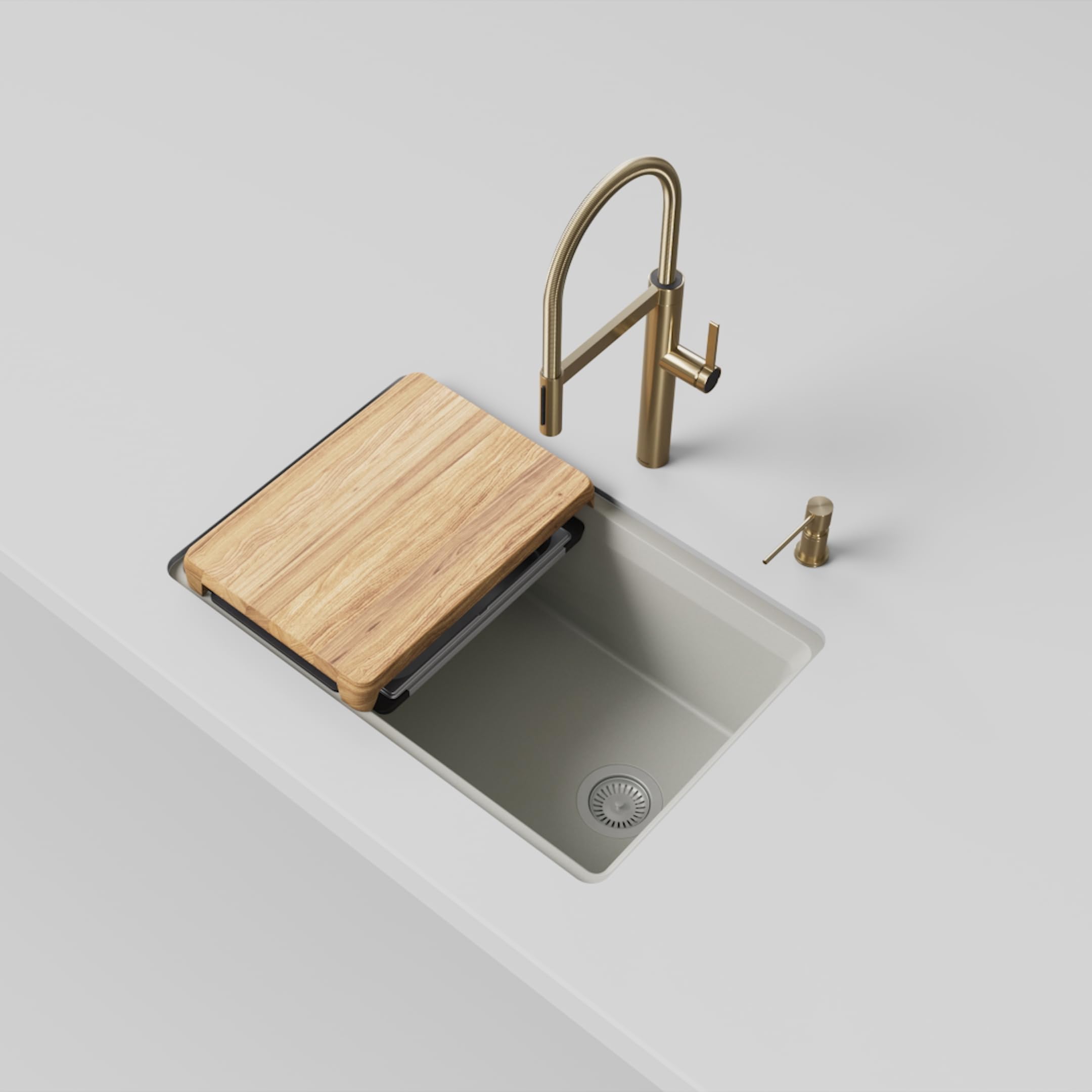 Soft white single-bowl kitchen sink with wooden cutting board, brass faucet, and soap dispenser.