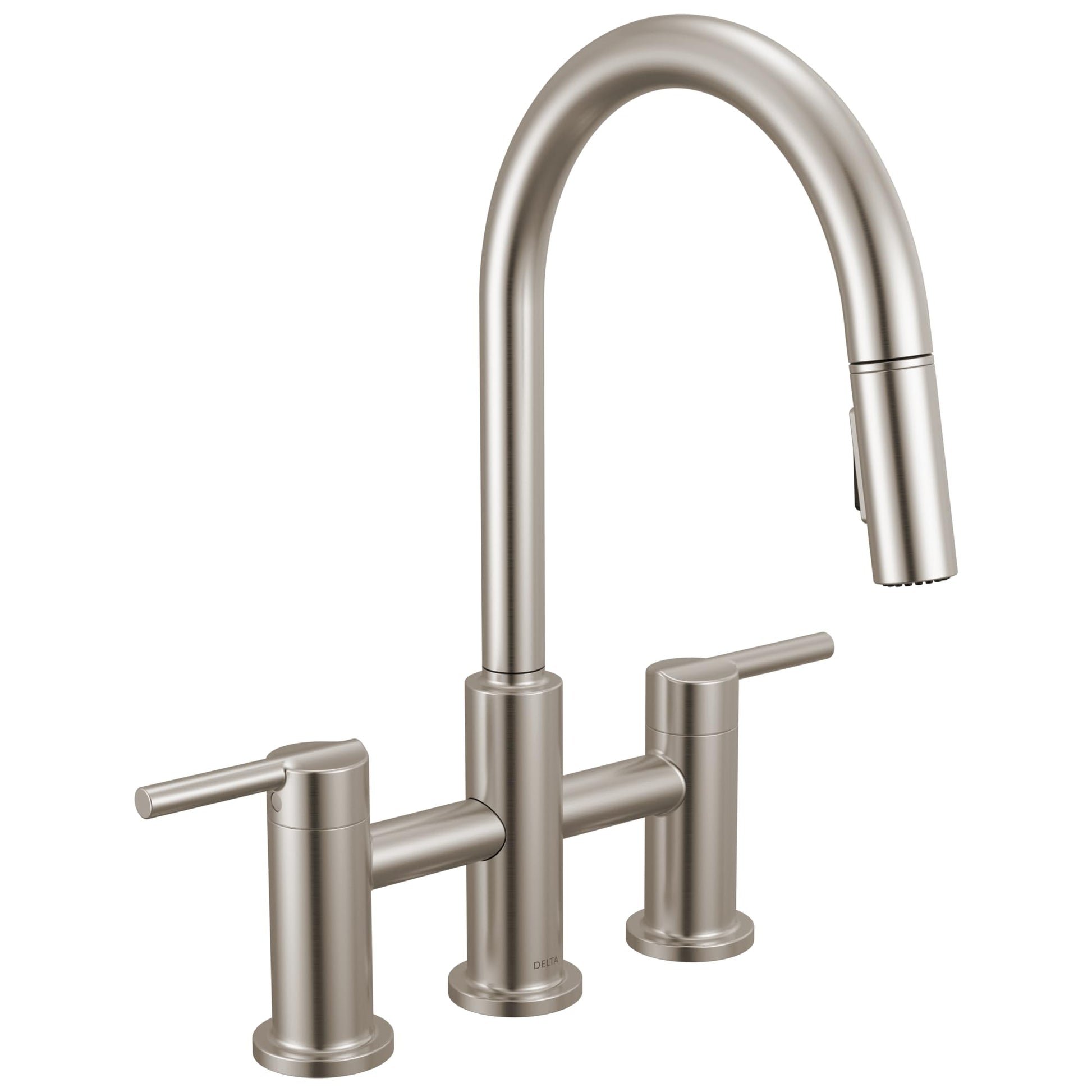 Stainless steel bridge kitchen faucet with two lever handles and pull-down spray head.