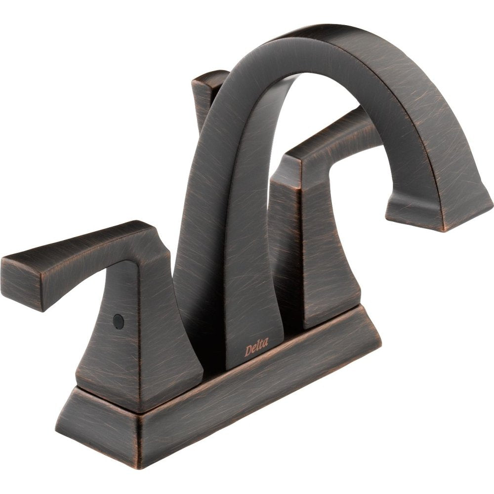 Bronze two-handle bathroom faucet with curved spout and rectangular handles on wide base.
