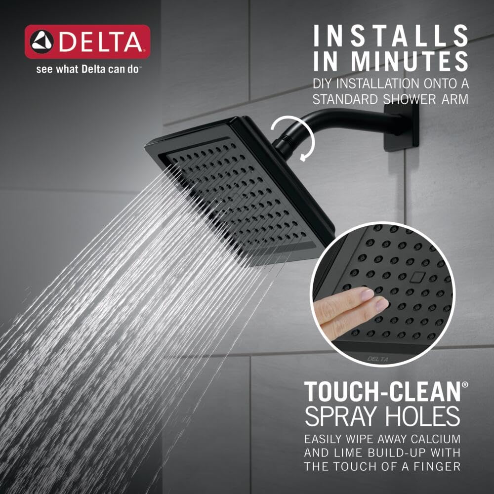 Matte black square raincan shower head mounted on wall with water spray visible and touch-clean nozzle detail inset.
