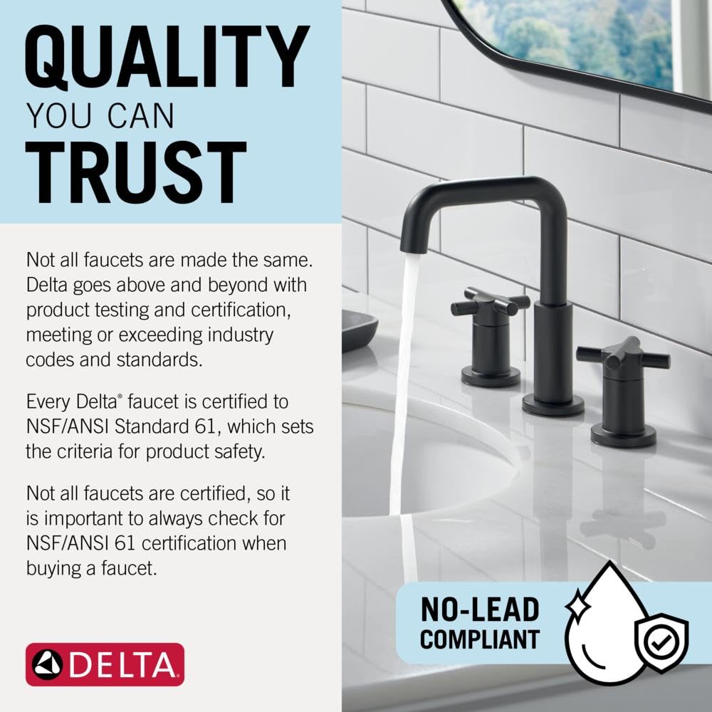 Matte black single-handle bathroom faucet with curved spout and cross handles mounted on white sink countertop.