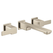Brushed nickel wall-mount bathroom faucet trim with two lever handles and angular spout design.