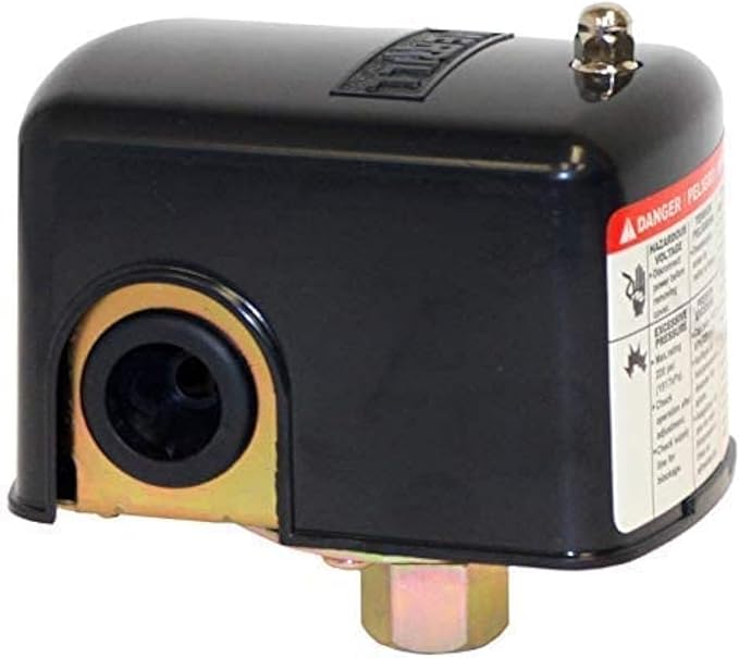 Black pressure switch with gold inlet port, manual lever on top, and red danger label on side.