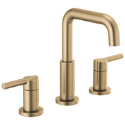 Champagne bronze widespread bathroom faucet with two lever handles and curved spout.