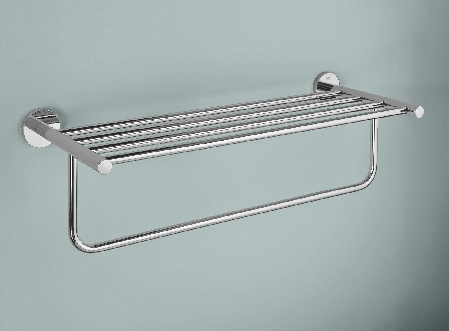 Chrome multi-towel rack with horizontal bars and curved towel rail below, mounted on wall with circular flanges.