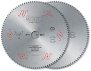 Two circular saw blades with fine teeth and center holes, marked with Freud branding and specifications.