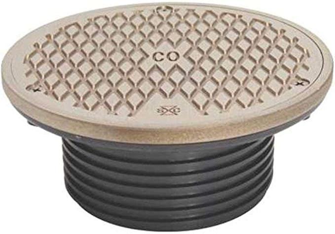 Nickel bronze circular cleanout top with diamond-pattern surface and threaded black base, 4 inch diameter.