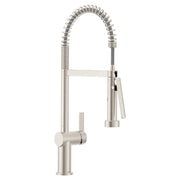 Stainless steel pre-rinse spring kitchen faucet with coiled hose and detachable spray head.
