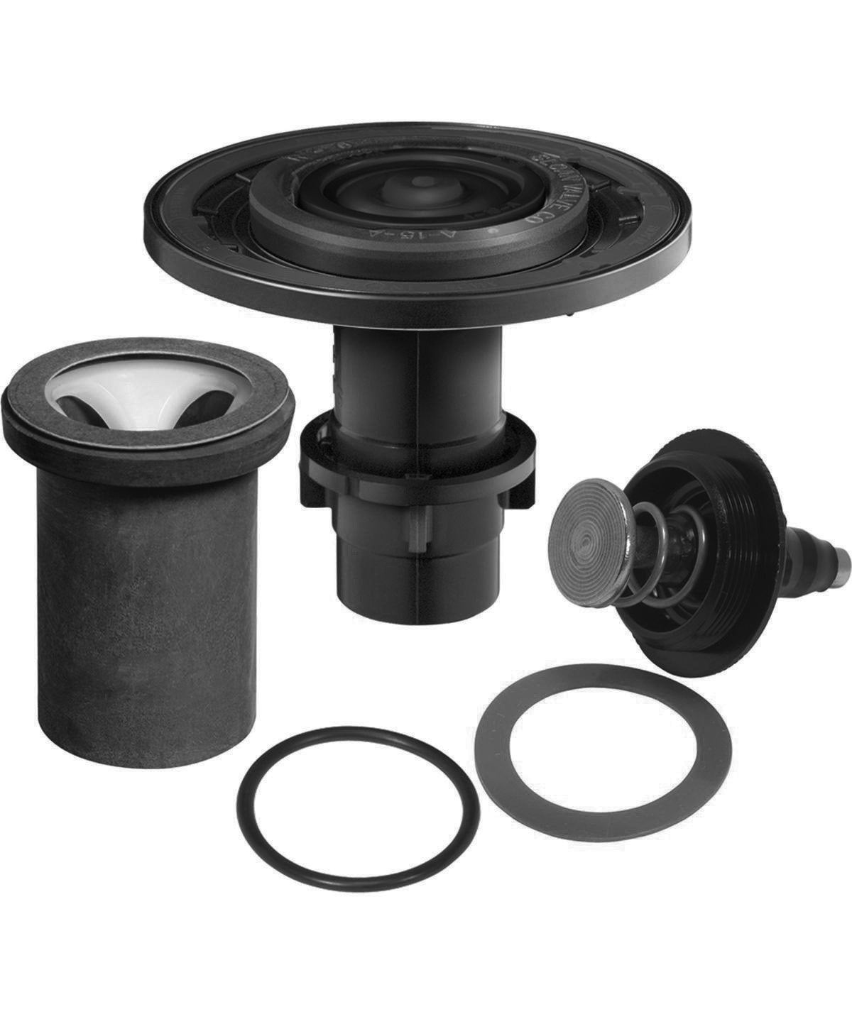Black Sloan Valve urinal diaphragm performance kit components including cartridge, gaskets, and rubber seals.