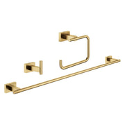 Three brushed gold bathroom accessories: towel ring, robe hook, and towel bar with square wall mounts.