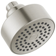Round stainless steel shower head with multiple spray holes and wall-mounted connector arm.