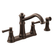 Oil rubbed bronze two-handle kitchen faucet with high arc spout and matching side spray attachment.