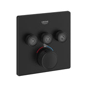 Matte black thermostatic shower valve trim with three function buttons and central temperature control dial.