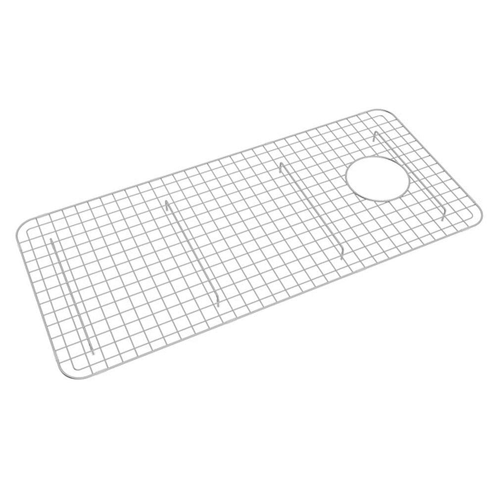 Stainless steel wire grid with small square mesh pattern and circular drain opening for kitchen sink.