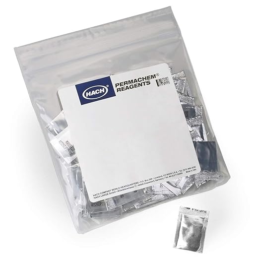 Clear plastic bag containing small silver foil pouches of Hach Permachem reagent powder with product label.